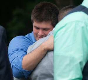 Joshua hugging Jared